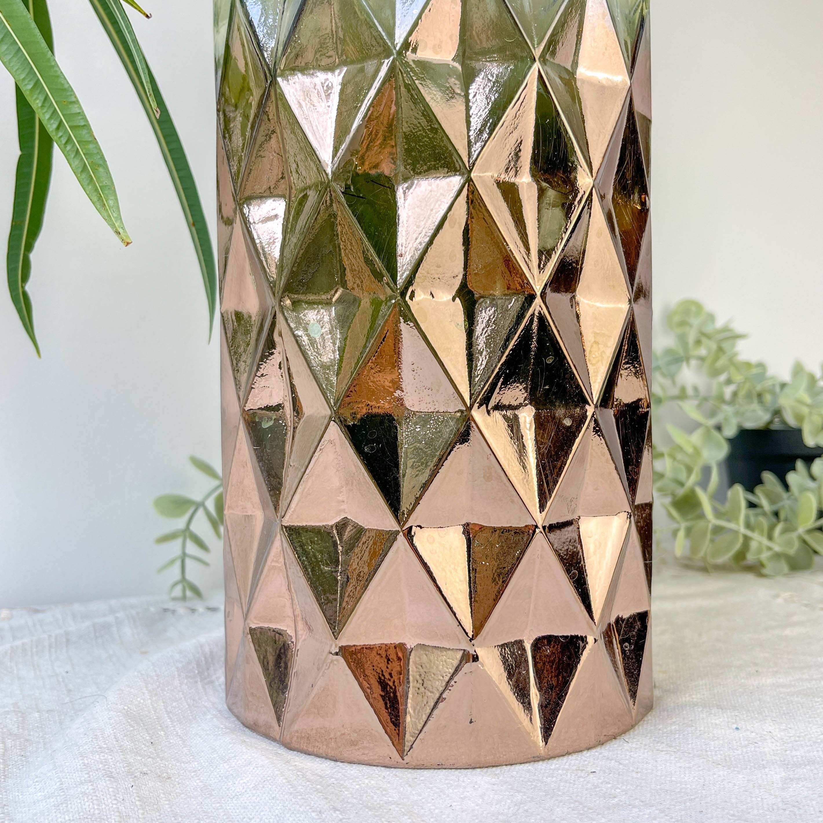 Vintage glass vase with geometric pattern in rose gold gradient