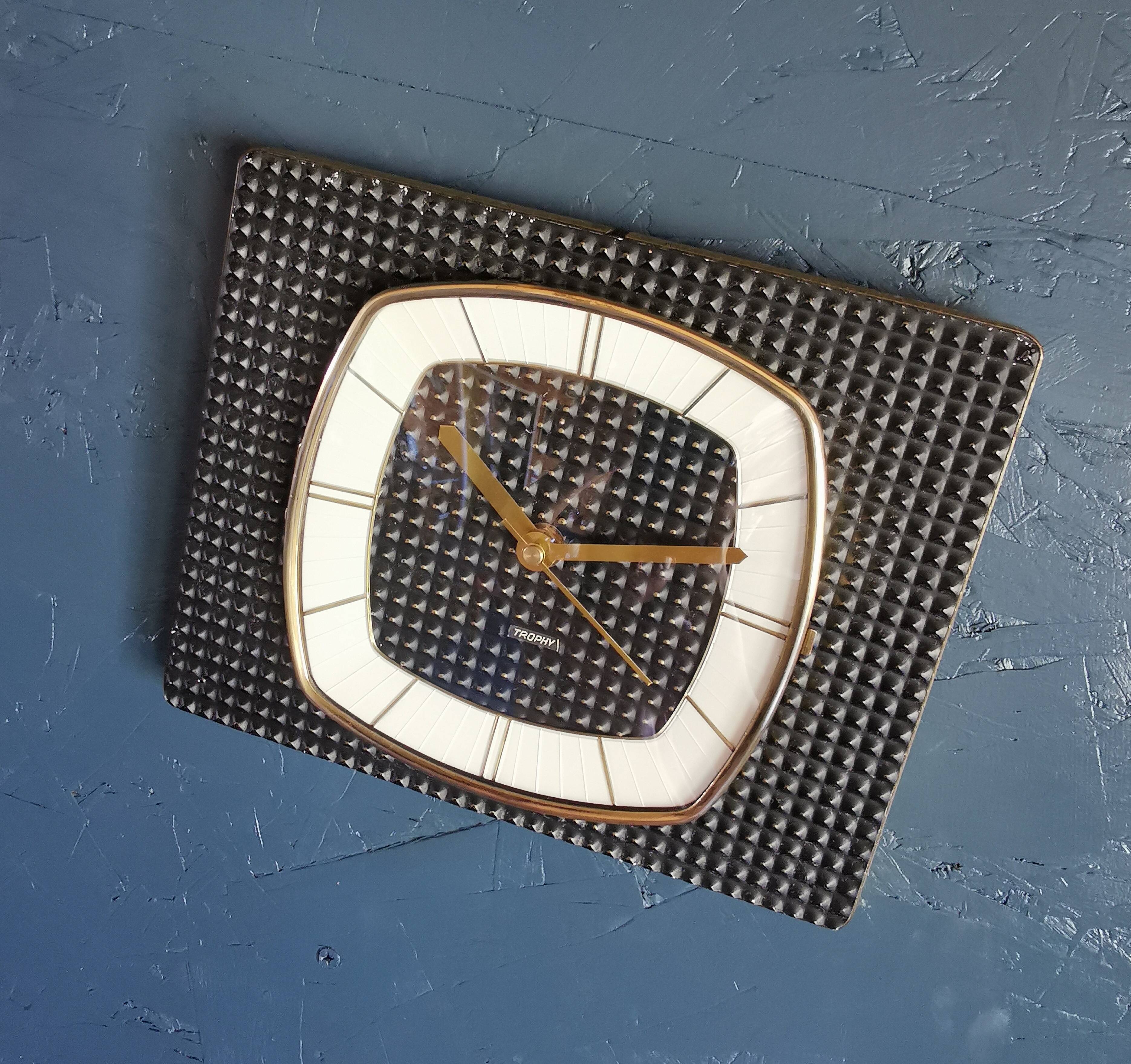 Vintage formica clock rectangular silent wall pendulum "Trophy black reliefs"
