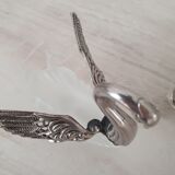Two frosted glass swan salt cellars with silver plating.