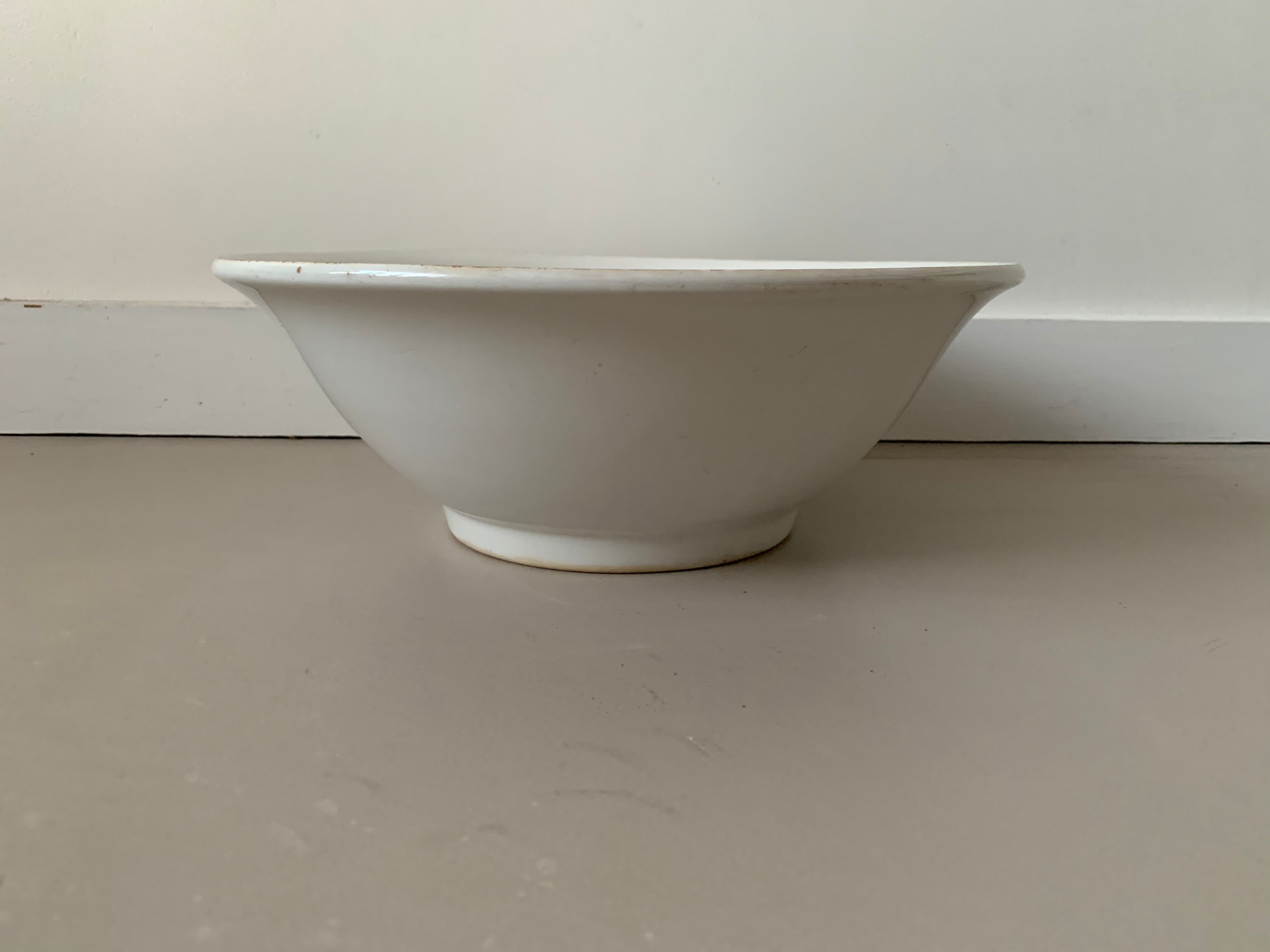Old white salad bowl