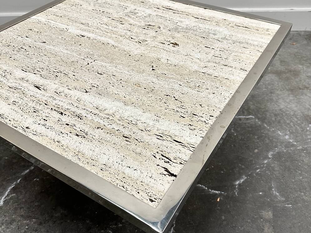 Brute travertine coffee table with brass base and chrome edges, France 1970s.