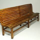 Long indoor railway station bench in solid beech wood 1930