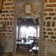 gray and gold patinated trumeau mirror