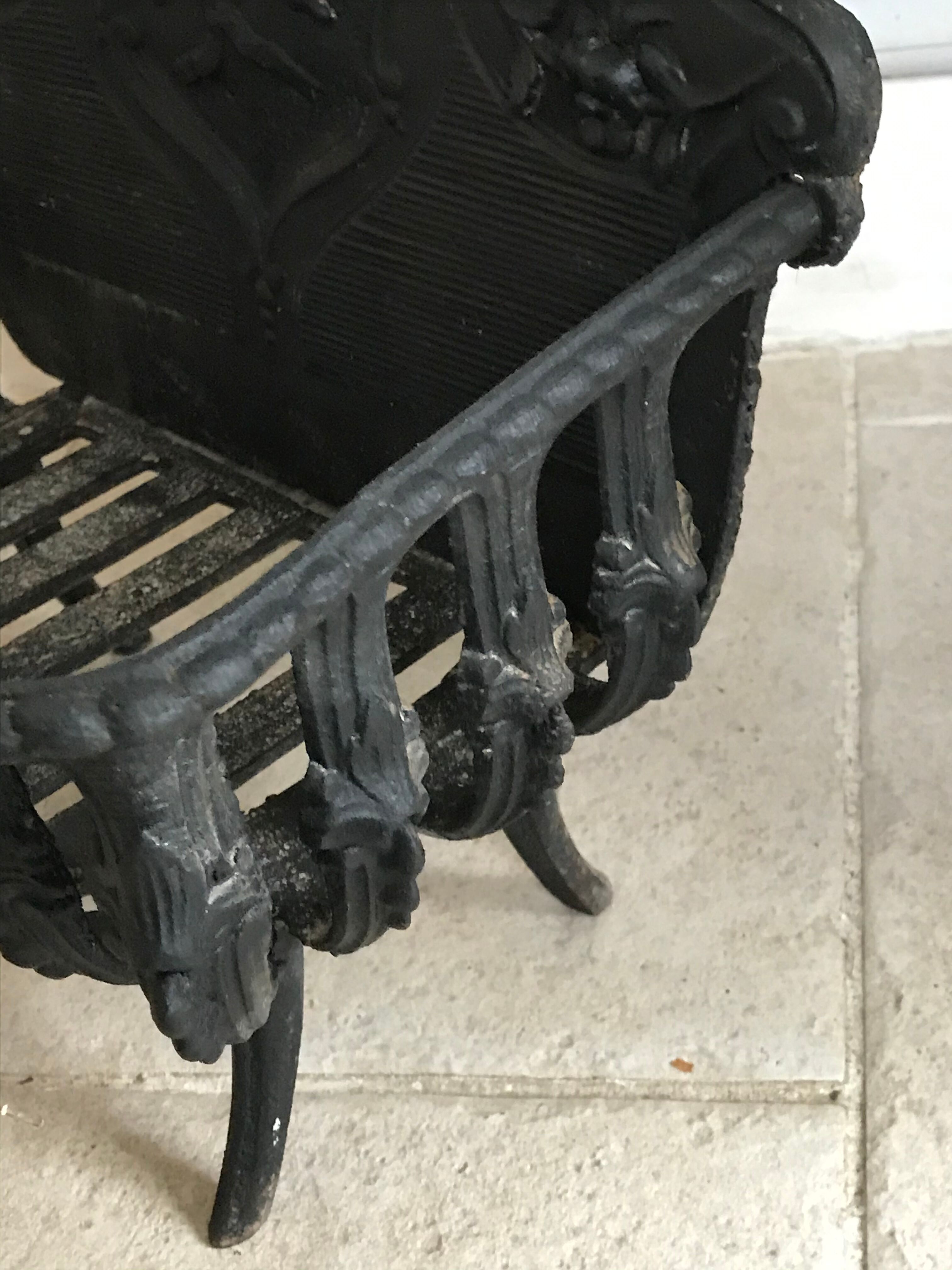 Cast iron fireplace cradle log holder