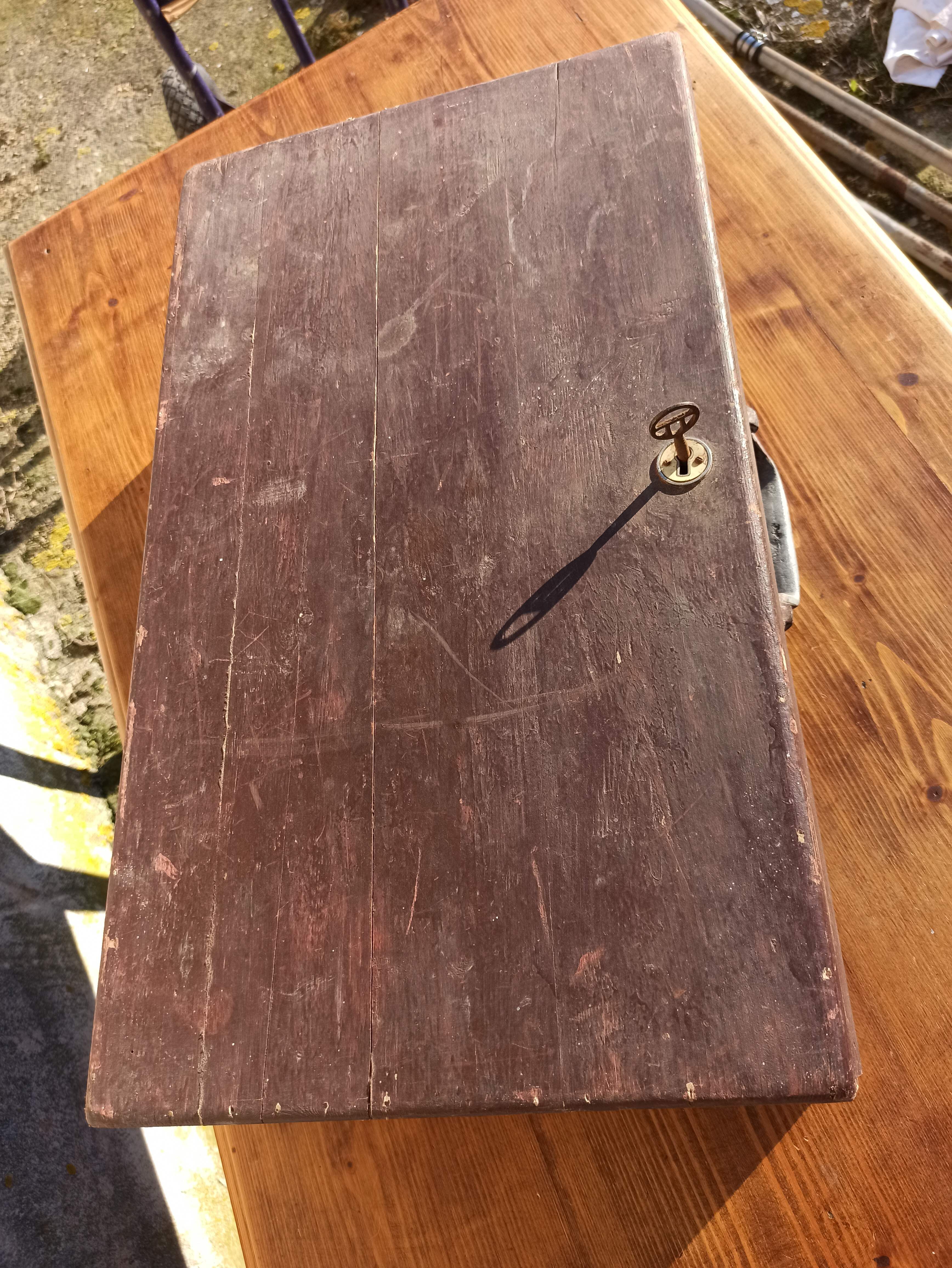 Antique wooden suitcase with lock and key