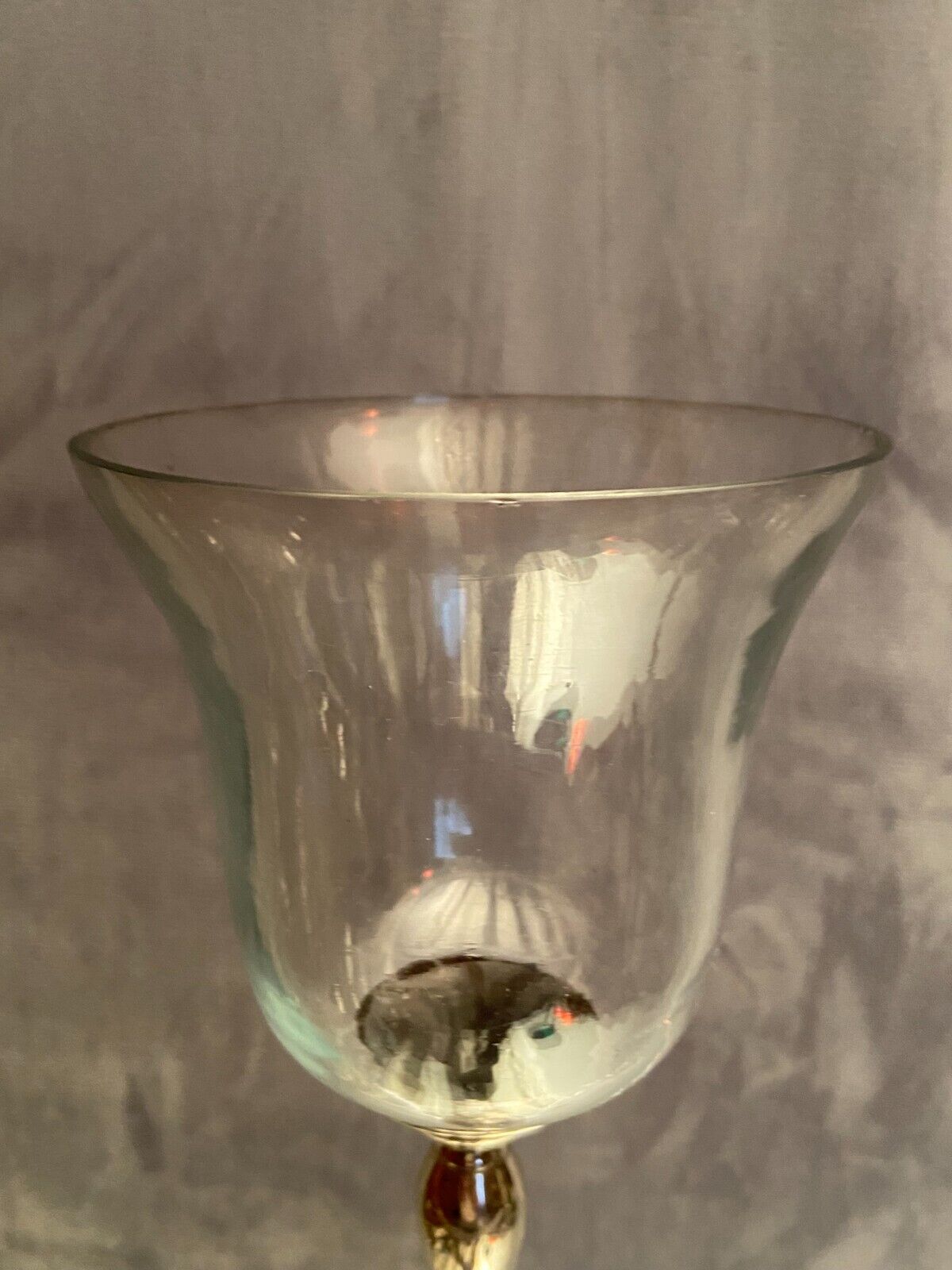 Glass photophore on high metal foot with silver patina