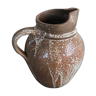 Pitcher in brown sandstone with effect of dripping and white speckling