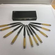 11 couteaux art déco, Bakélite et plaqué argent dans un coffret