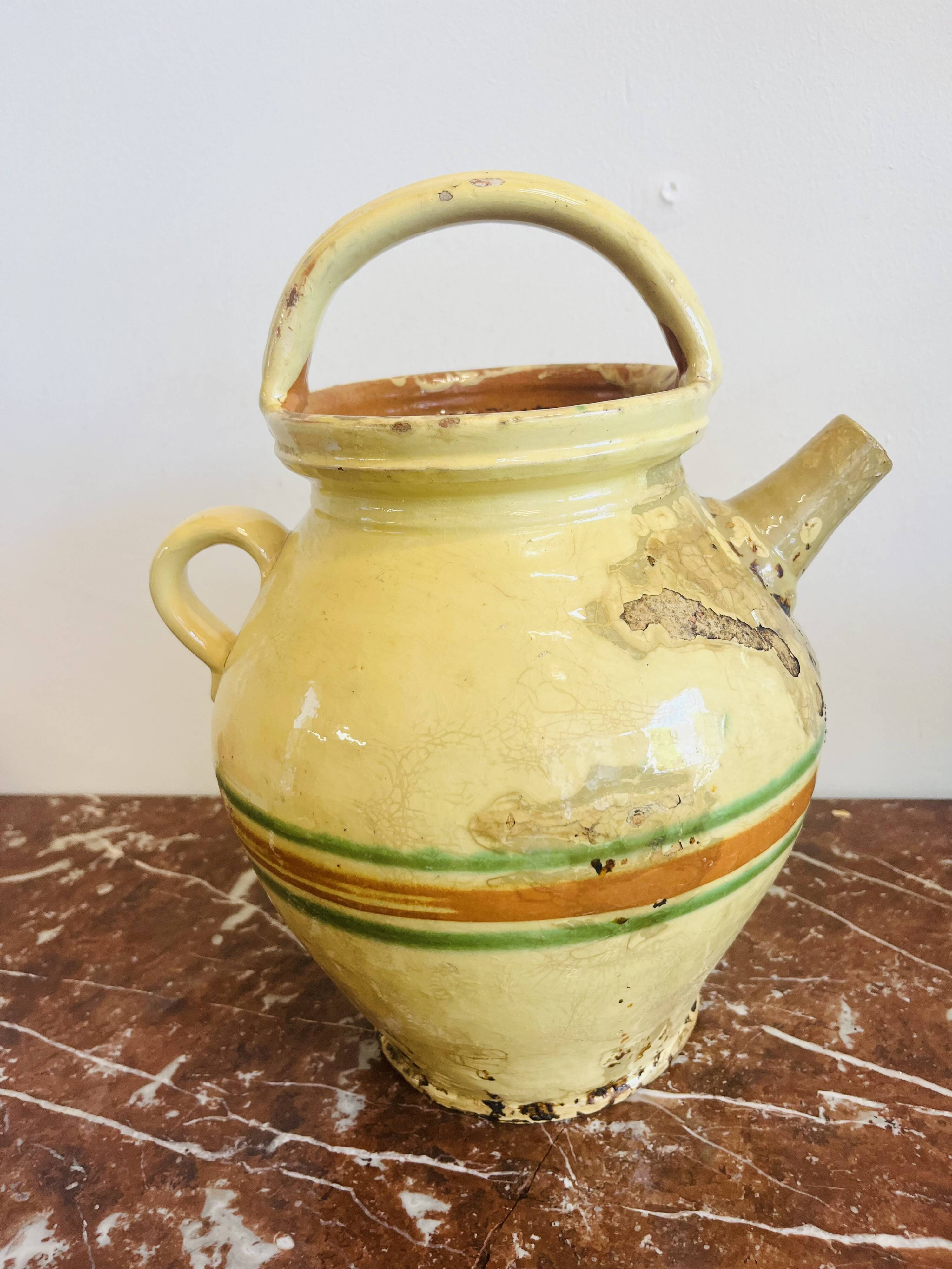 Old Savoyard pottery, decorated with orange and green edging