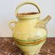 Old Savoyard pottery, decorated with orange and green edging