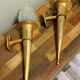Pair of large medieval-style torchiere lamps in gilded metal