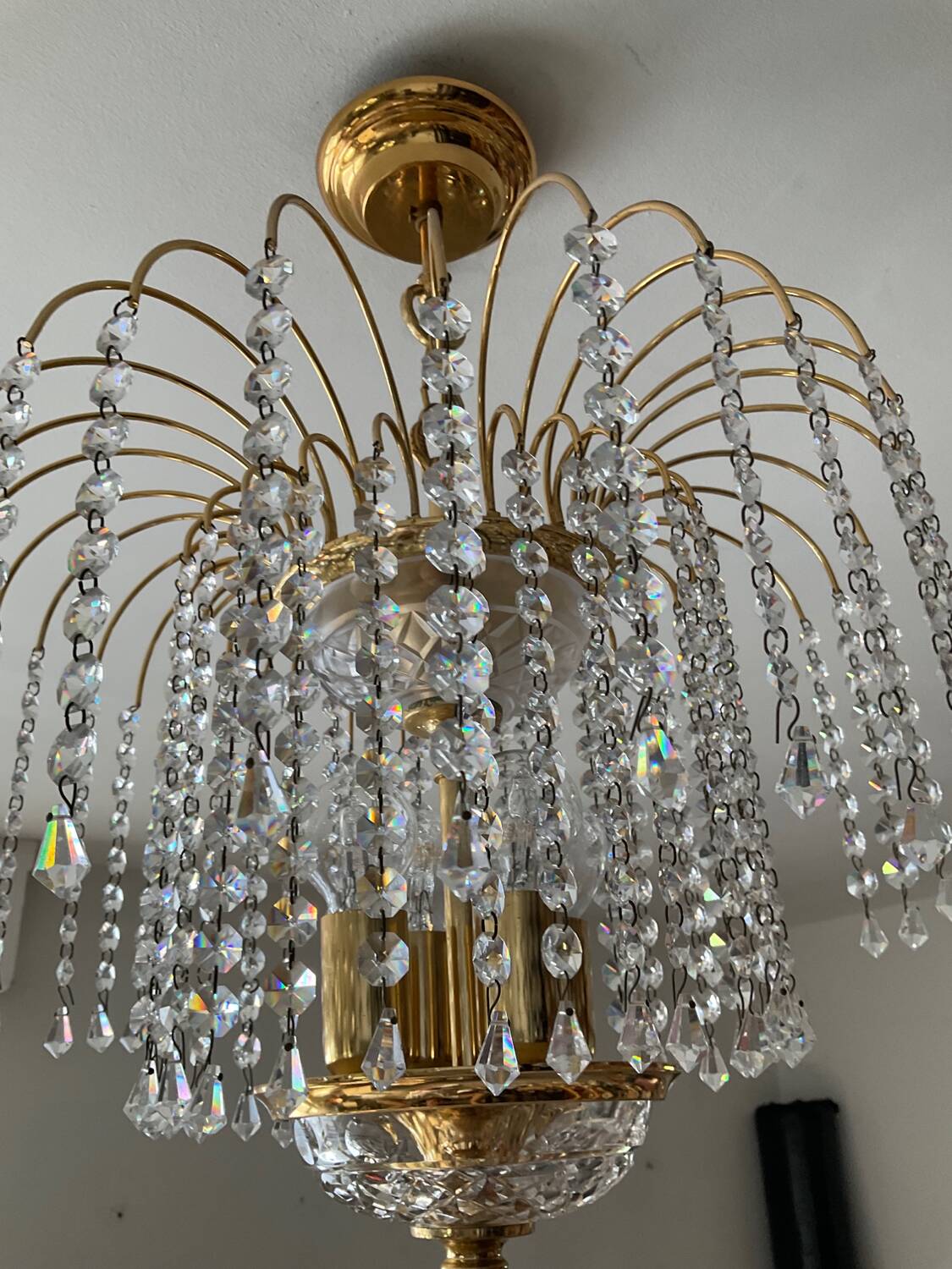 Brass waterfall chandelier with crystal tassels