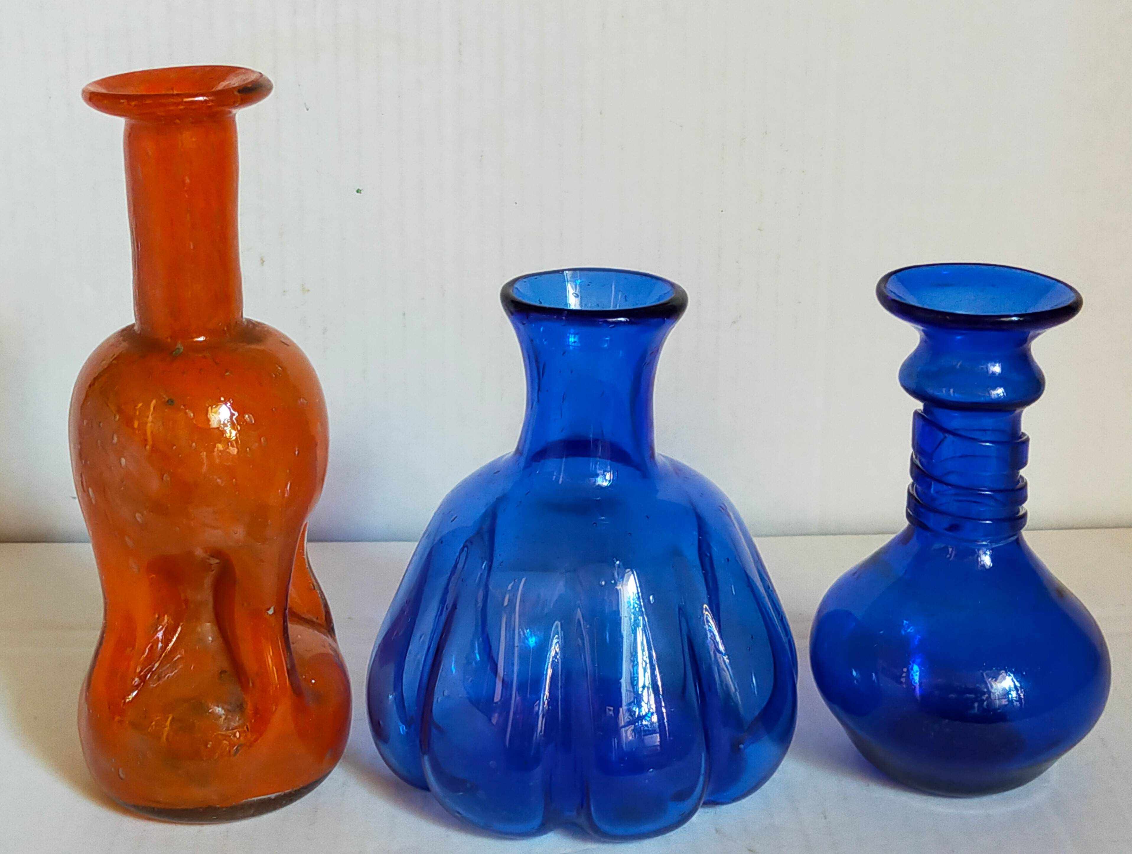 Trio of vintage blown glass soliflore vases