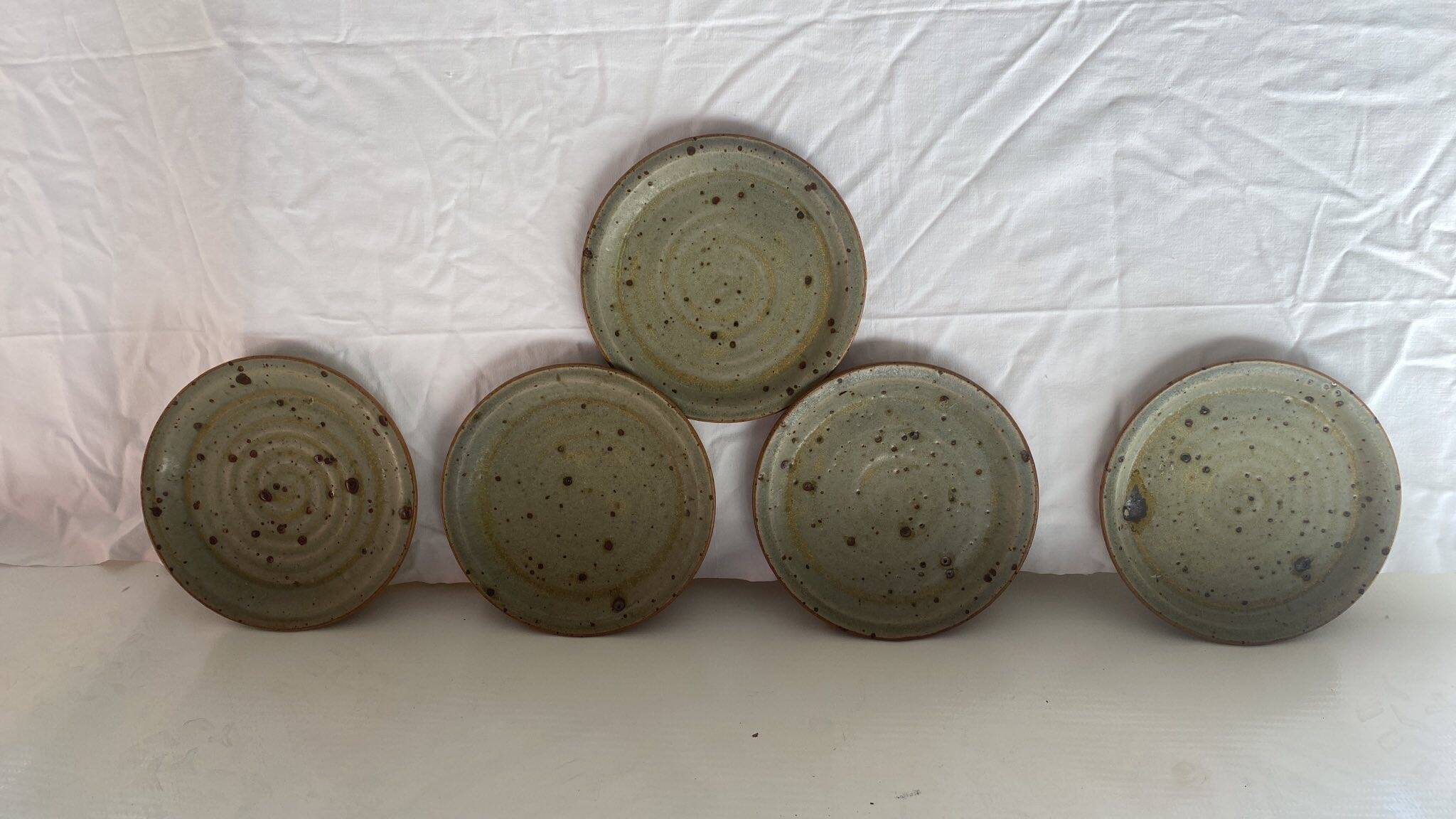 5 vintage plates, beautifully made, branded on the back