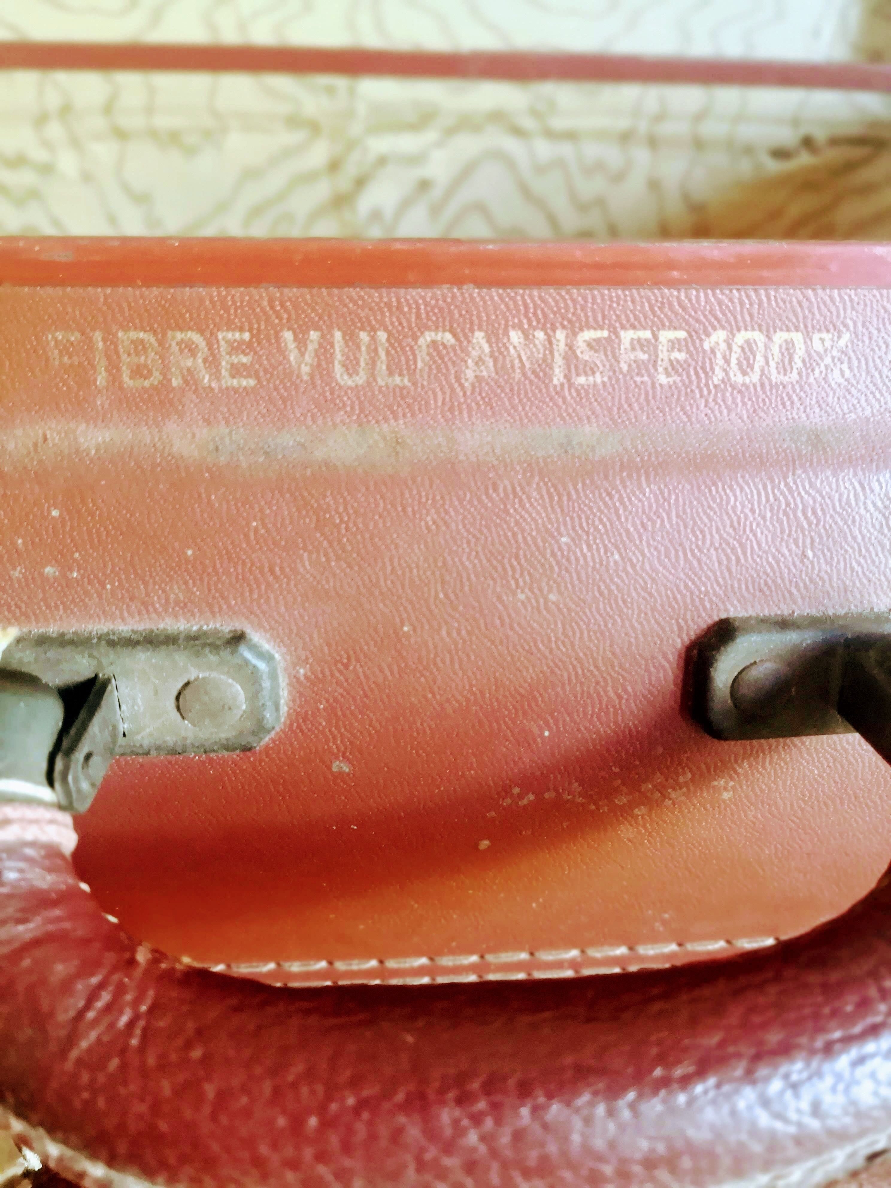 Old suitcase in vulcanized fibre