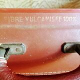 Old suitcase in vulcanized fibre