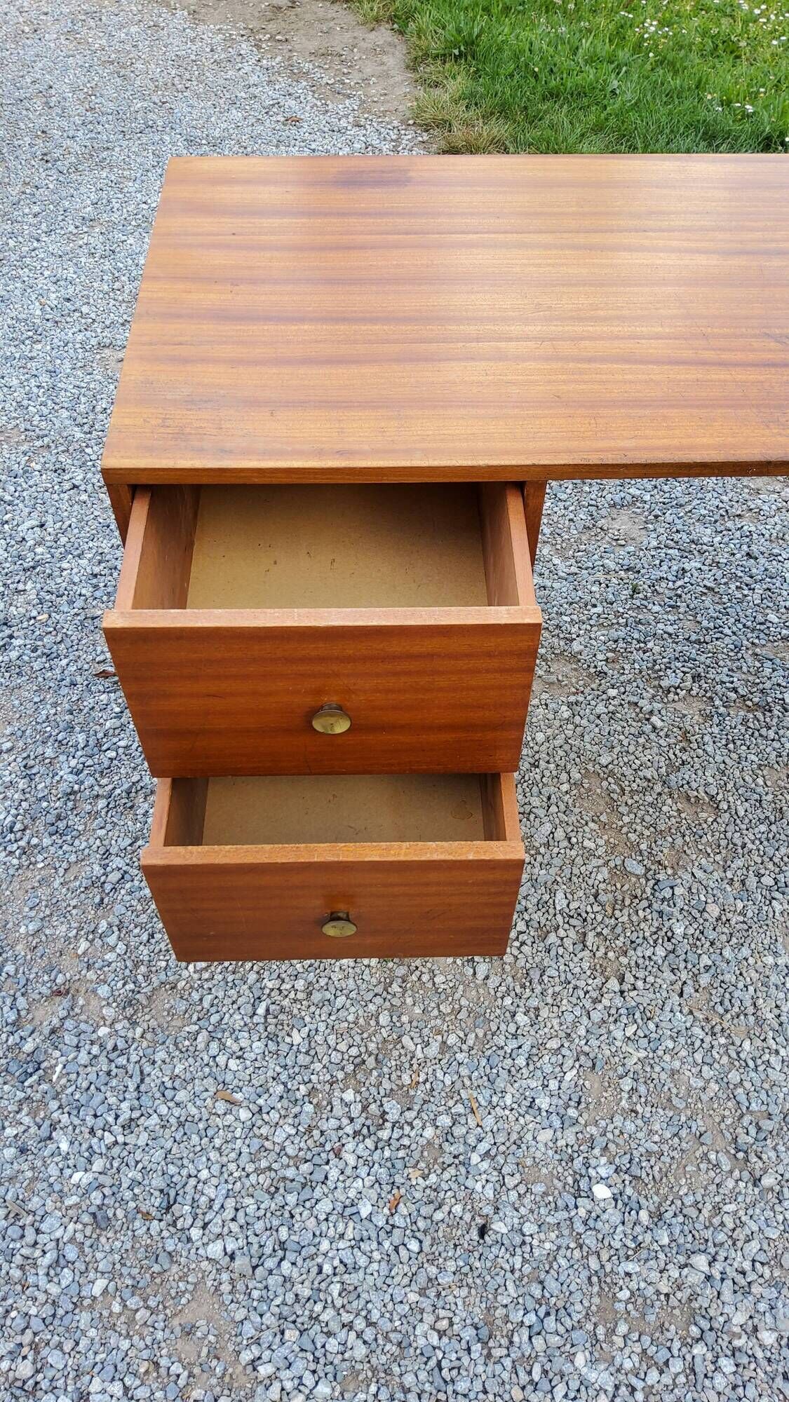 60s desk in golden blond mahogany with conical coffered feet
