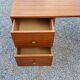 60s desk in golden blond mahogany with conical coffered feet