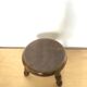 Low tripod stool in solid wood