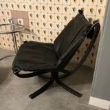 Leather Falcon armchair and footrest