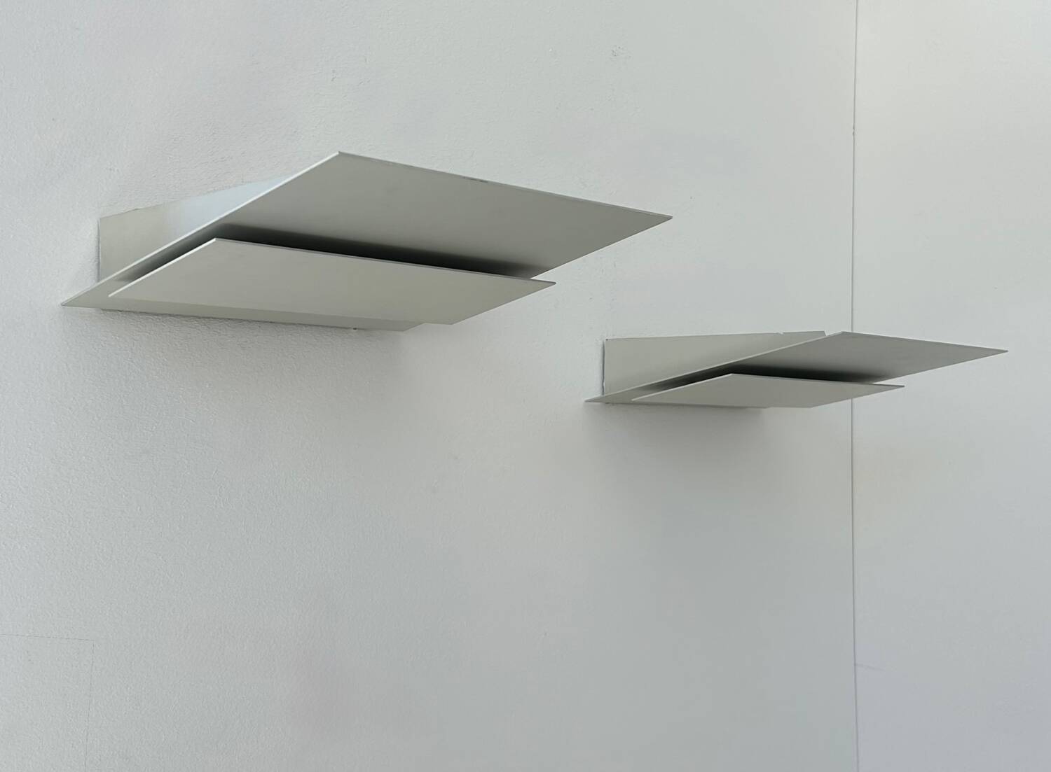 Pair of vintage wall lights, cast aluminum, France 1970