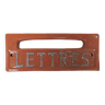 Old letters plaque in enameled terracotta