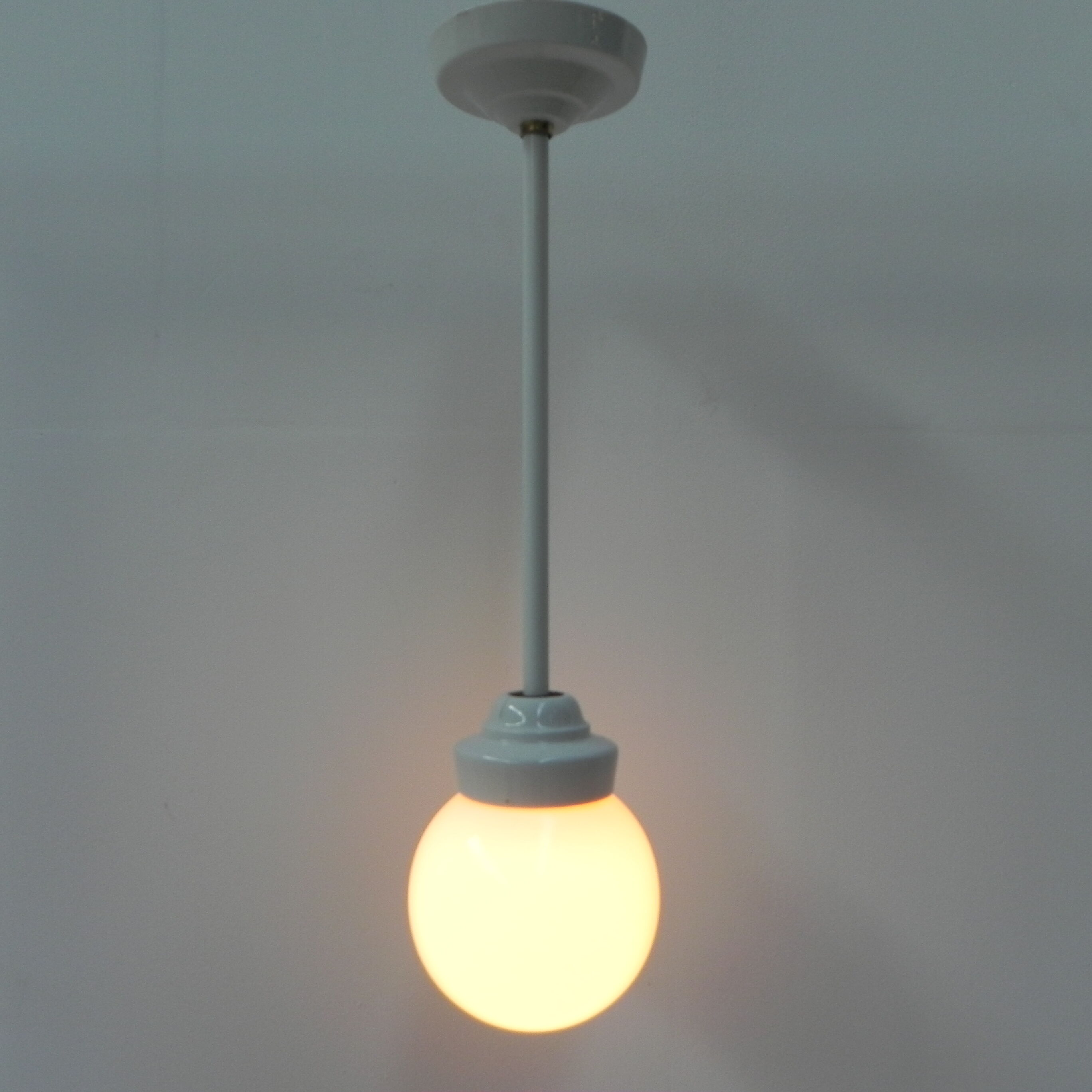 Art Deco hanging lamp with white glass ball