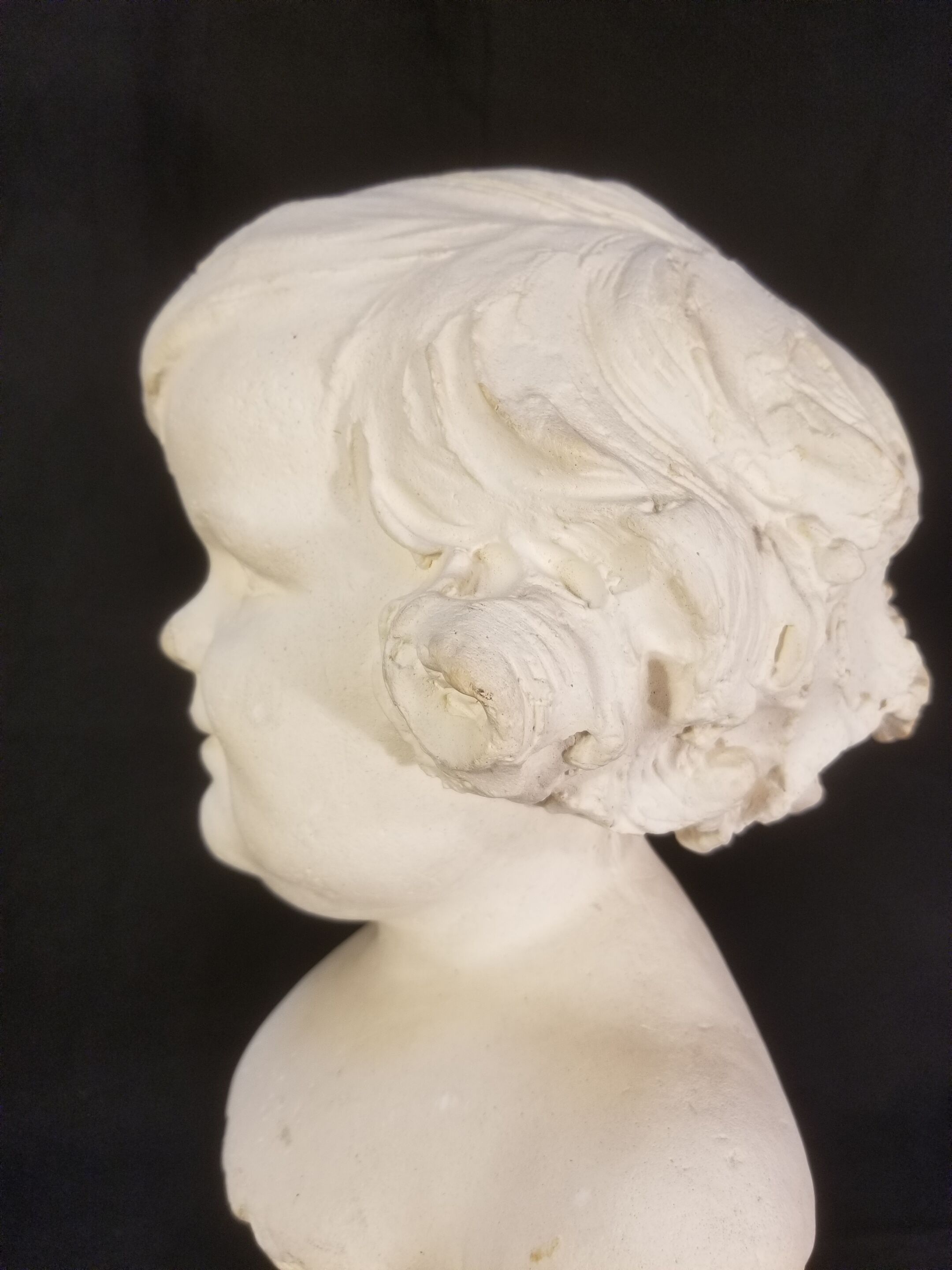 Old plaster bust - The gracious child