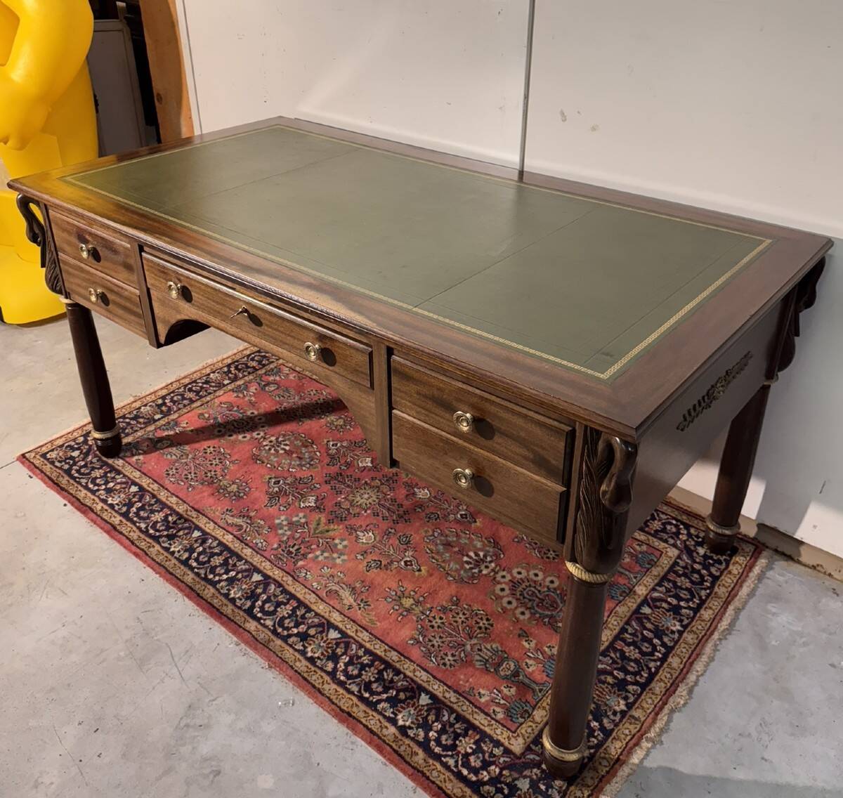 Empire-style minister's desk with swan necks in mahogany.