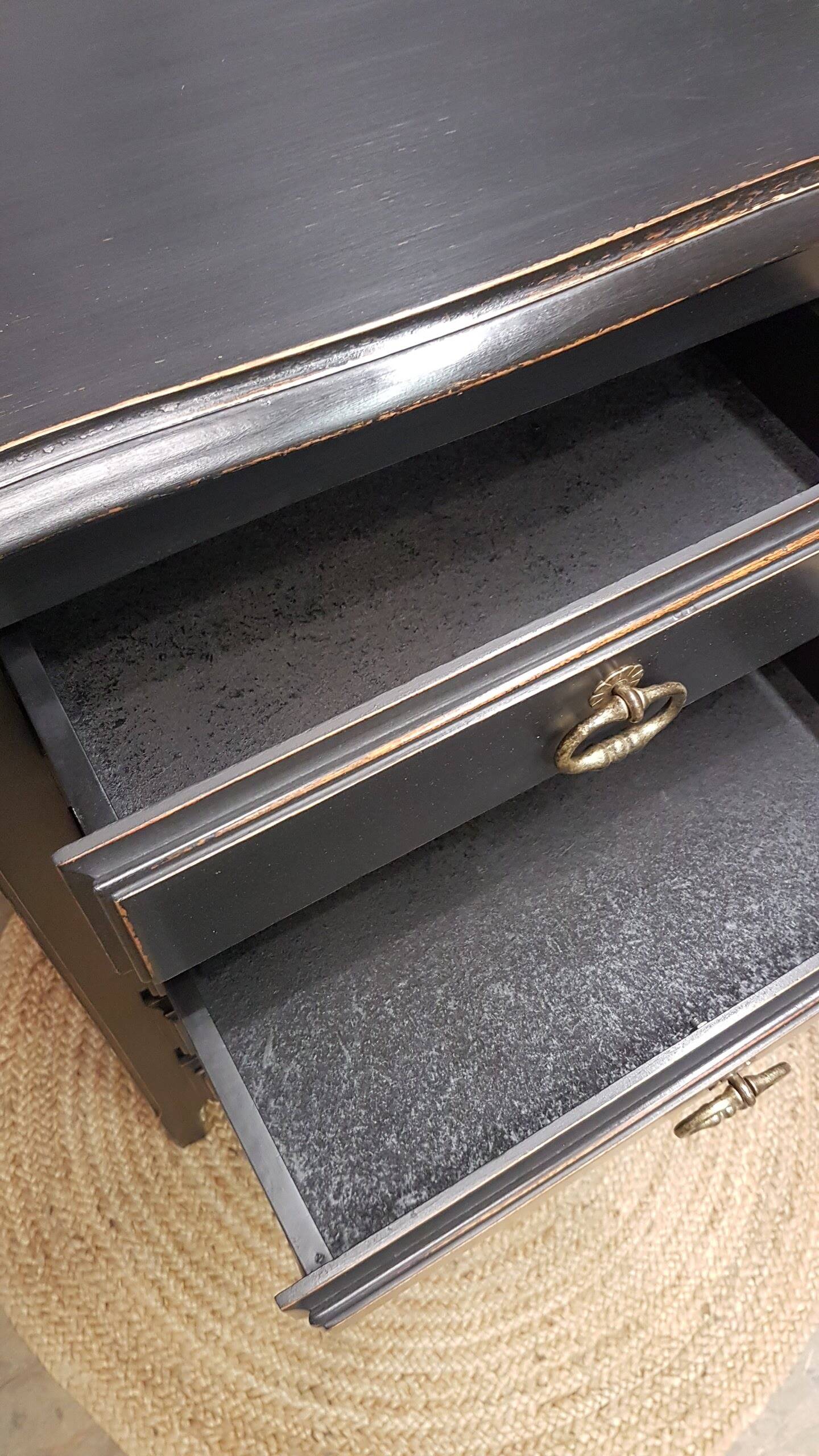 Cherry wood chest of drawers with 5 drawers in aged black.