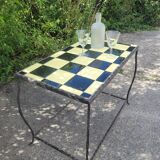 Coffee table with tiled and wrought iron finish