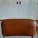 Chaise pliante structure tube et simili cuir