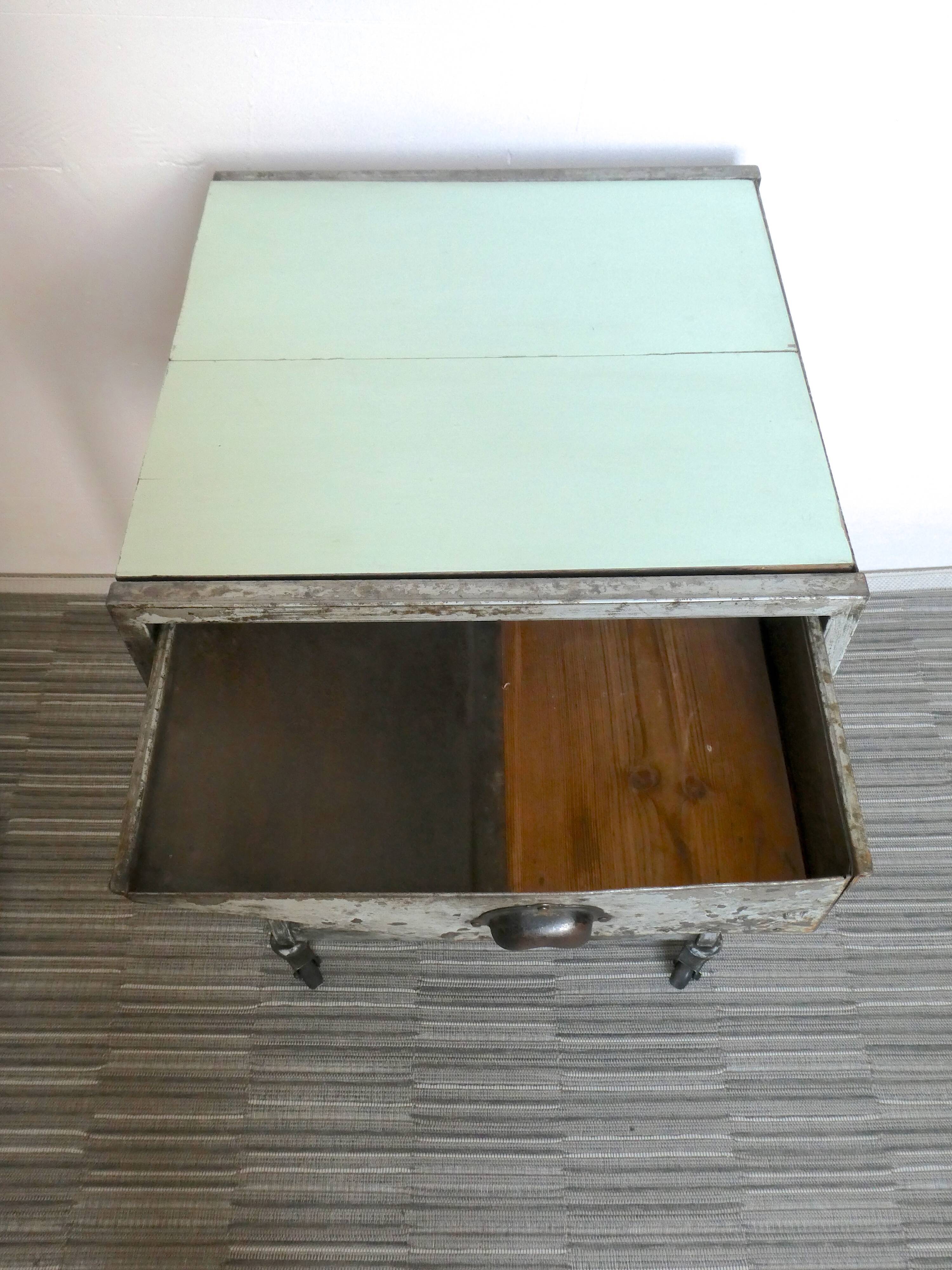 Industrial storage, workshop, in metal and wood, furniture on wheels
