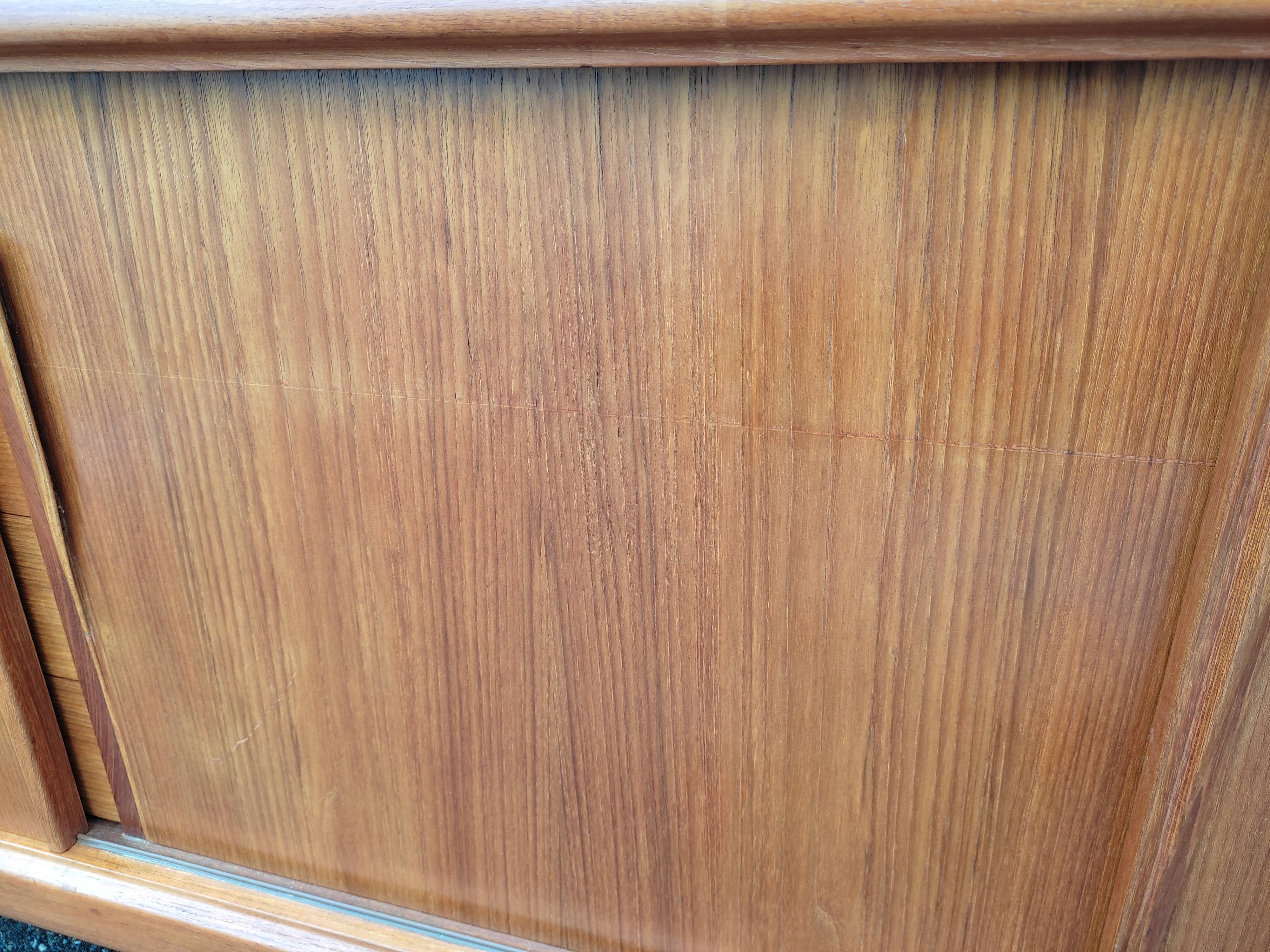 Scandinavian teak row by Axel Christensen for ACO Mobler