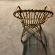 Wicker shell armchair from the 60s/70s in very good condition.