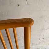 Set of 4 Scandinavian light wood dining chairs with beige polyester upholstered seats