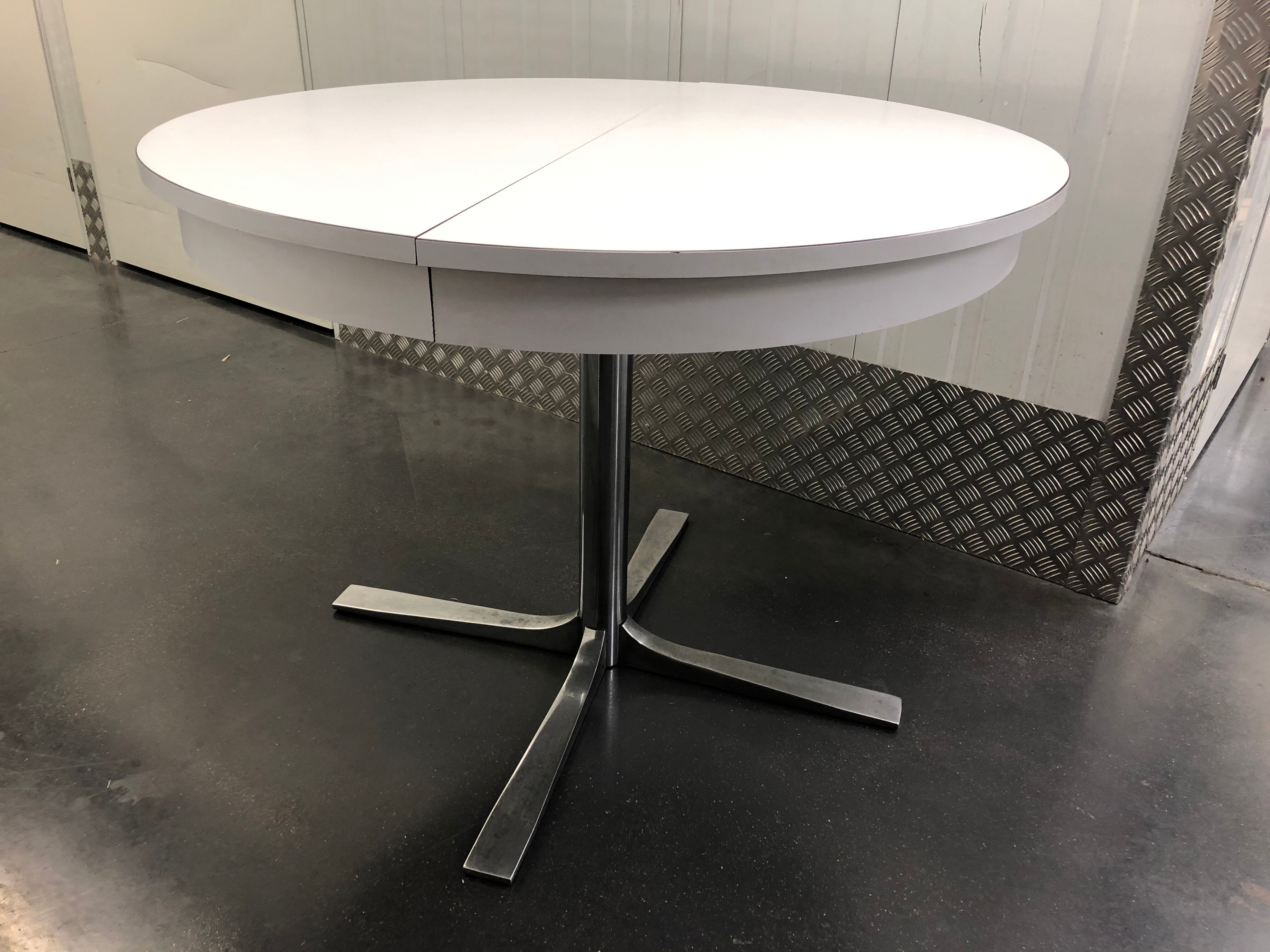 Rosalie round table with white extensions and chrome foot circa 1970