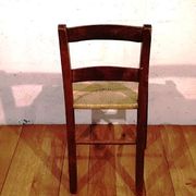 Vintage children's chair in wood and straw