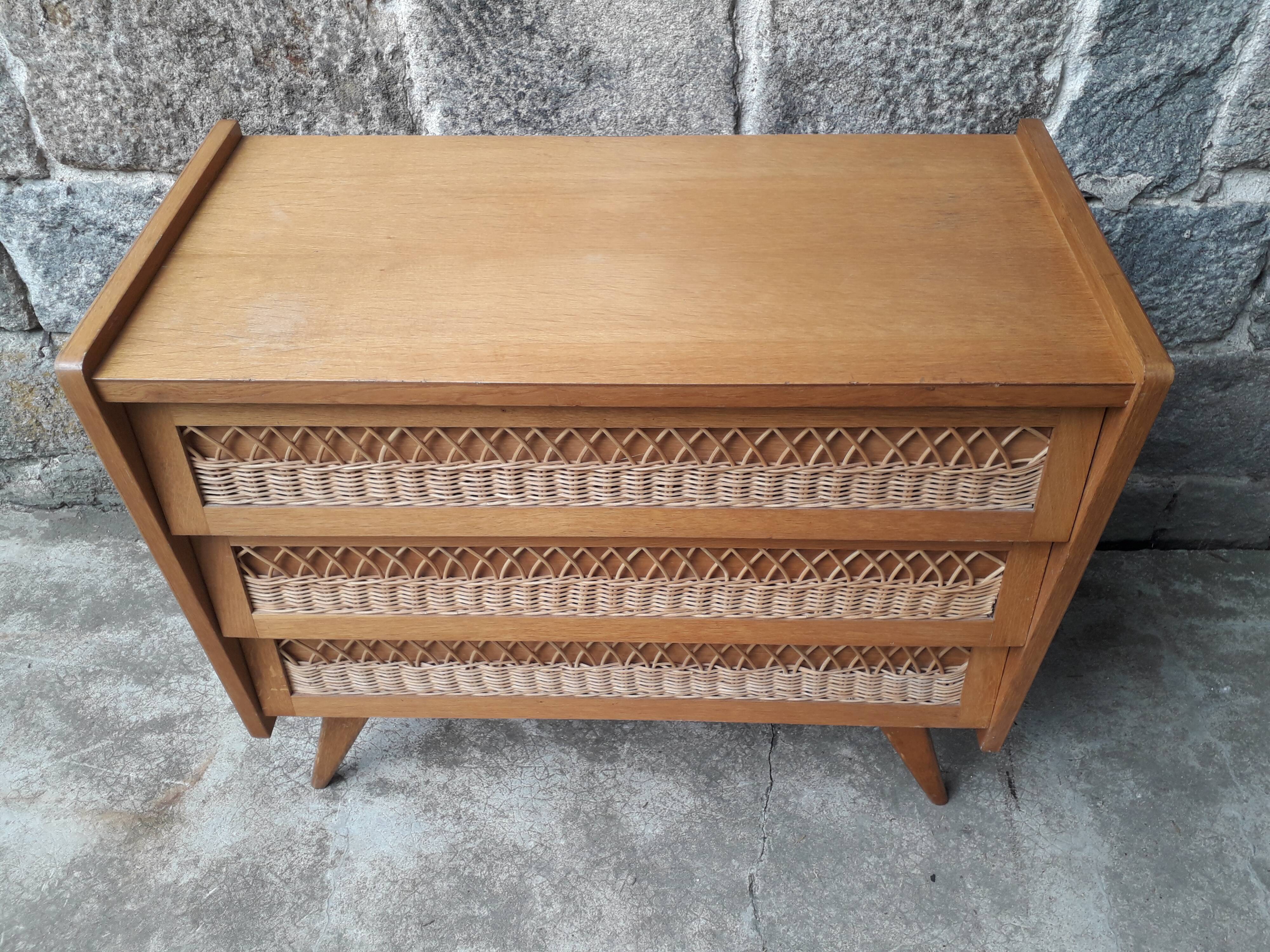 Vintage chest of drawers in rattan compass feet