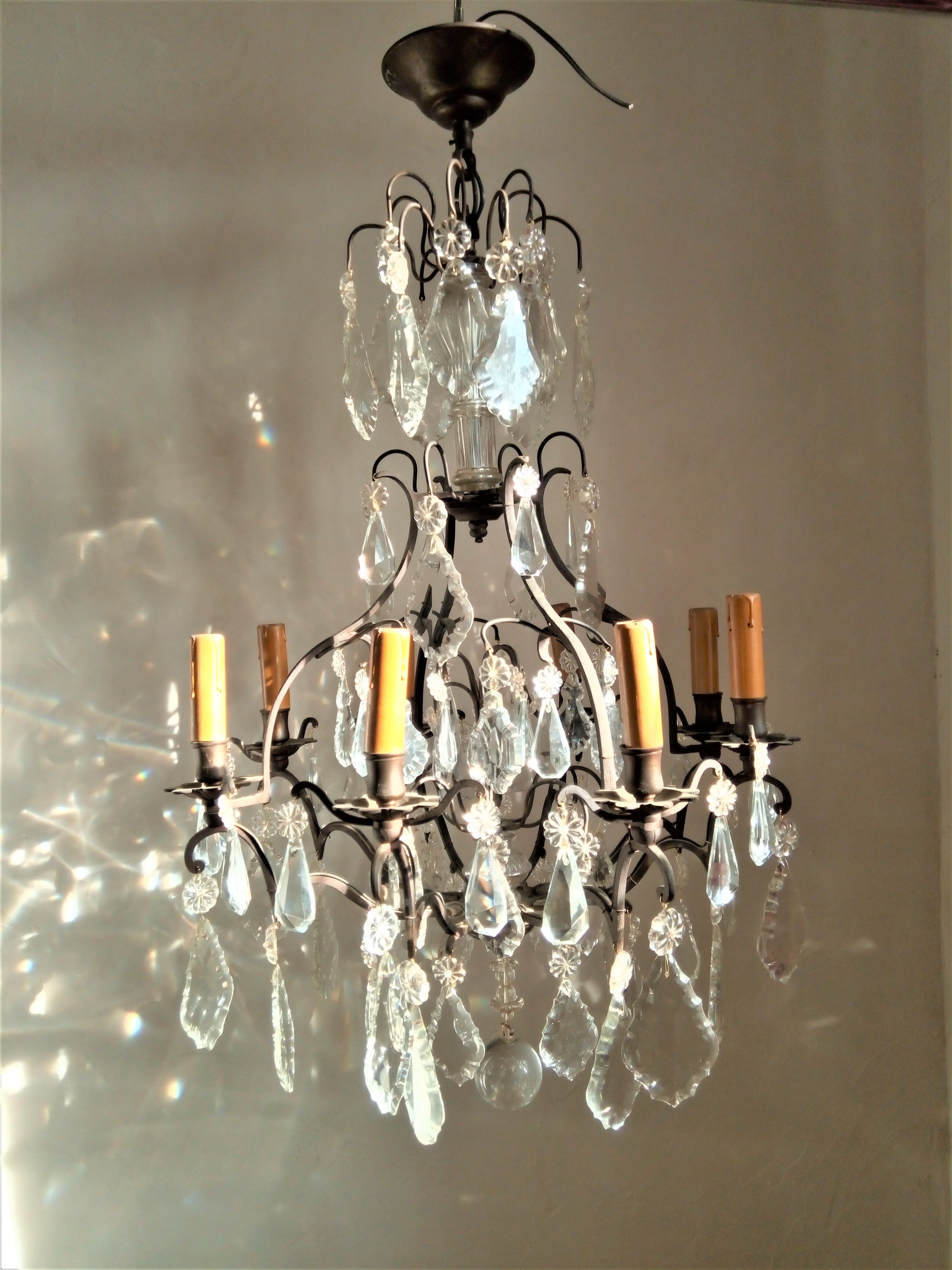 Old chandelier with tassels, bronze and crystal, 8 lights. Louis XV style.