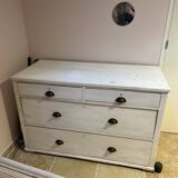 Sturdy antique sideboard with solid wood and drawers.