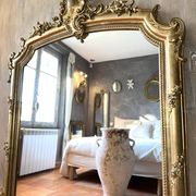 19th-century gilded antique pediment mirror