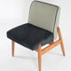 Black and white armchair without armrests