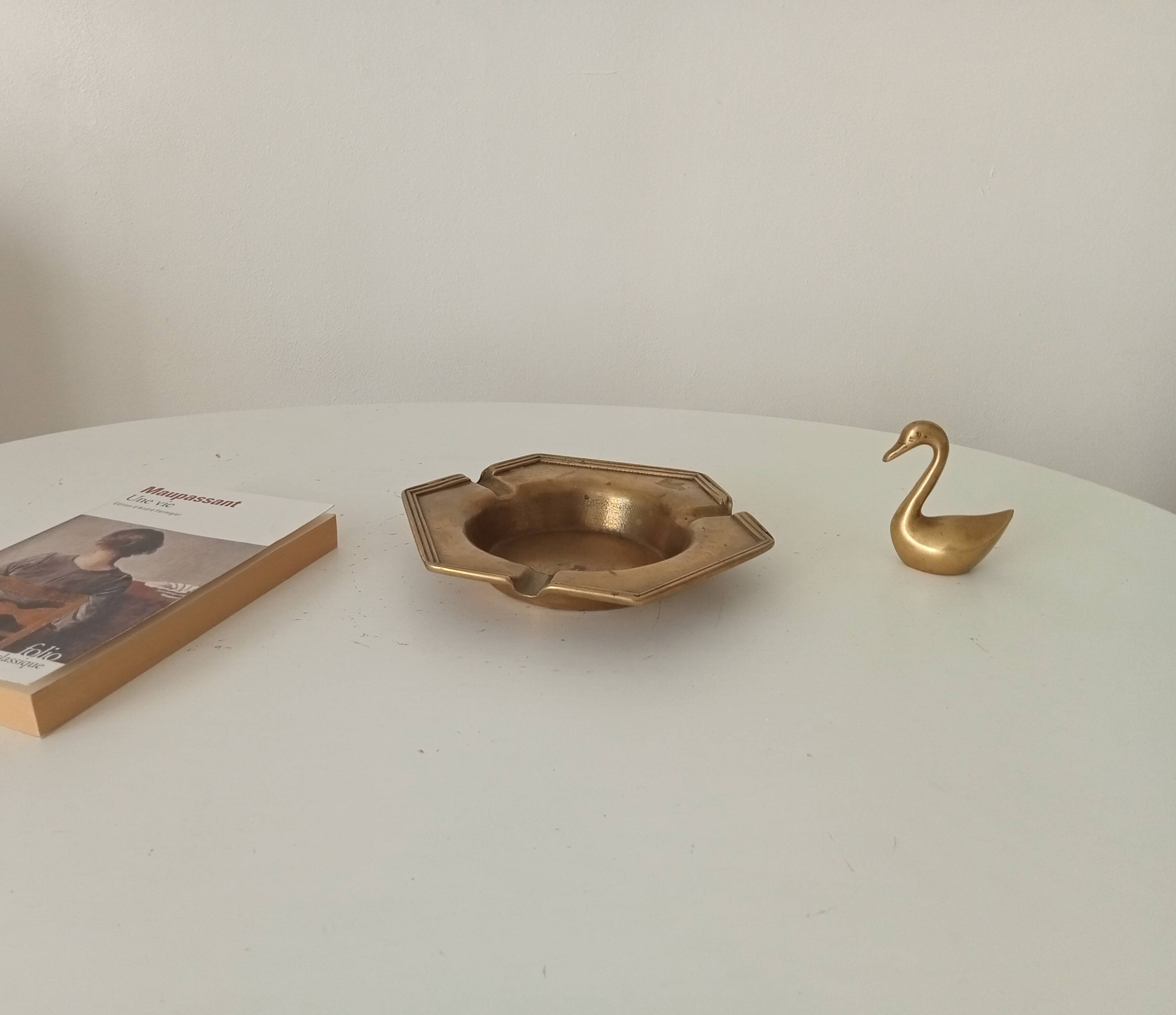 Antique ashtray in solid gilded brass