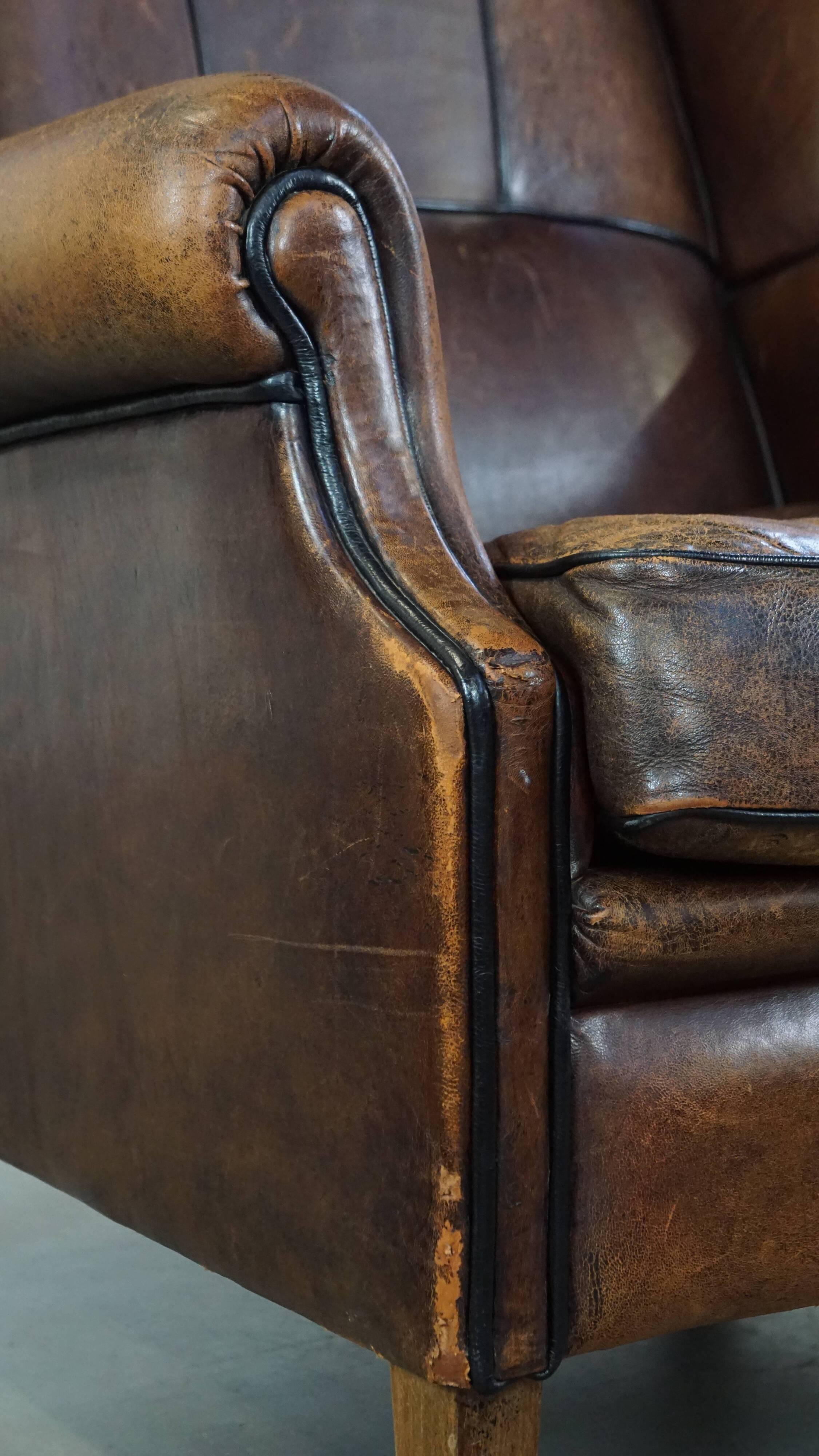 Sheep leather wing chair with patina