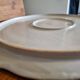 Antique pie dish in St Clément faience with a basket hen motif.