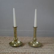 Pair of brass push-button candlestick holders in gold metal, bohemian country decoration