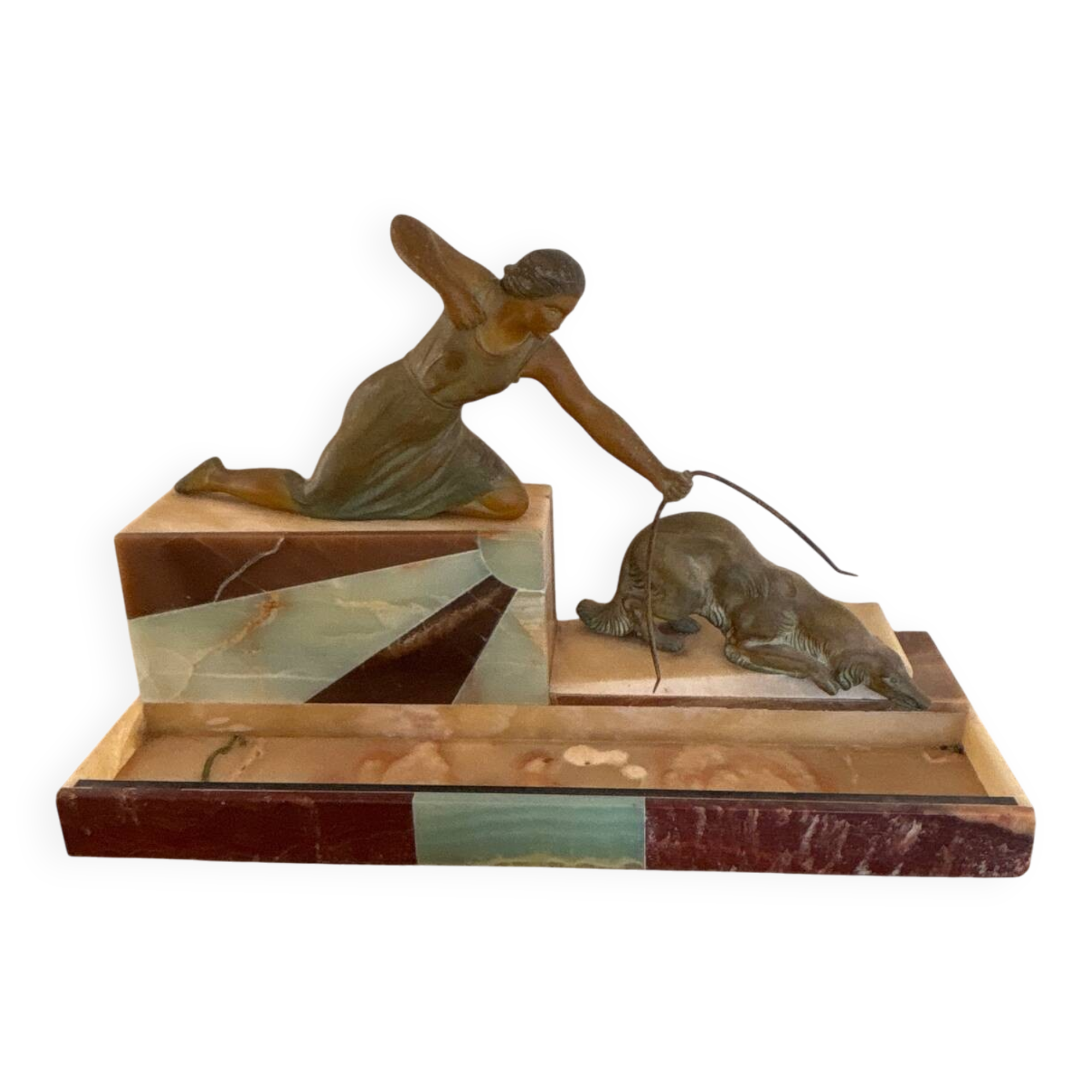 Sculpture of a woman with a greyhound