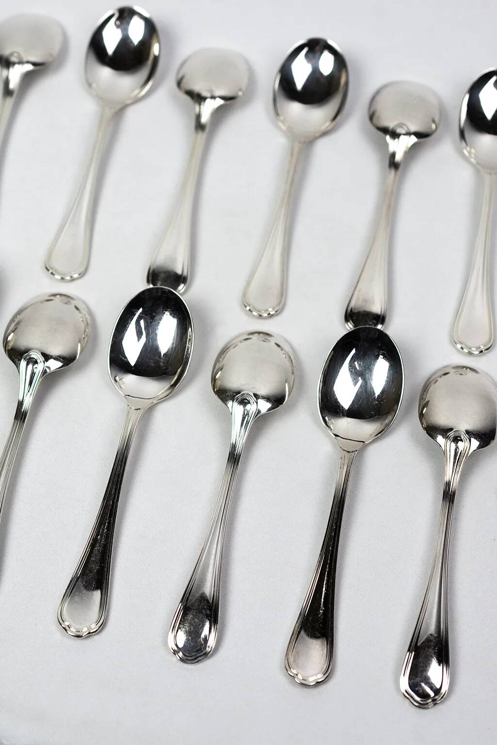 Christofle – 12 silver-plated coffee spoons Spatours in their case