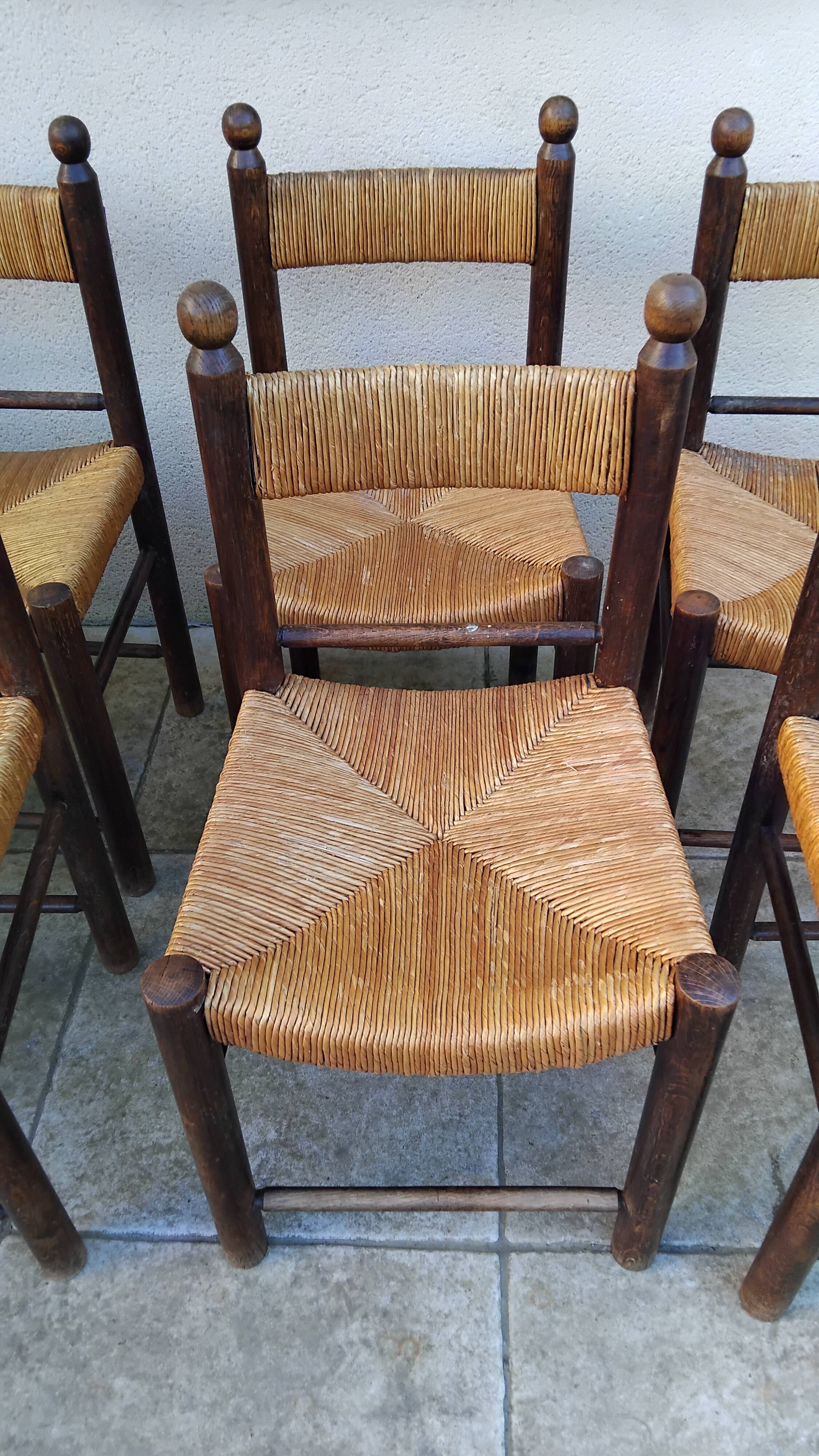 8 vintage straw chairs from the 1950s.